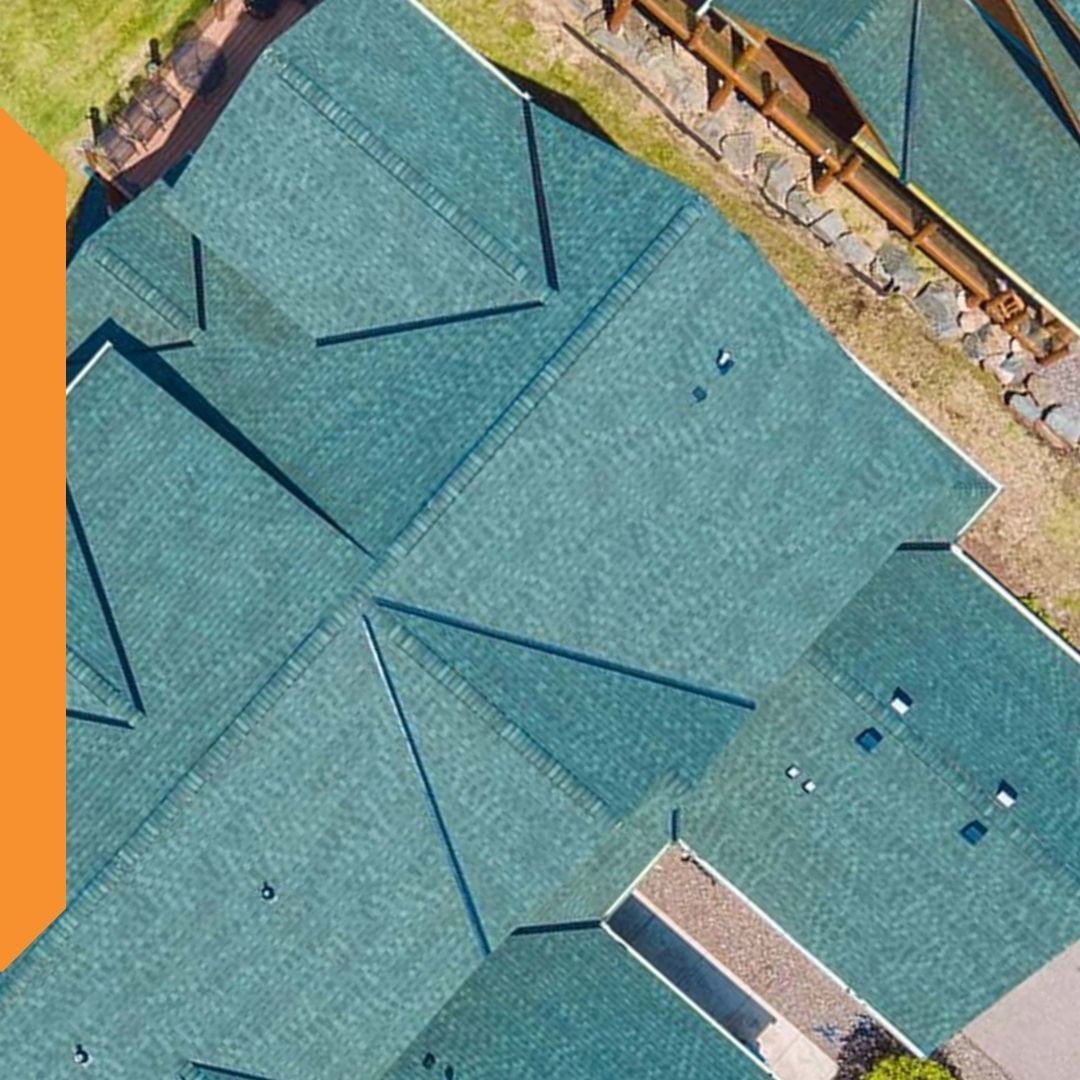 overhead view of large teal shingle roof